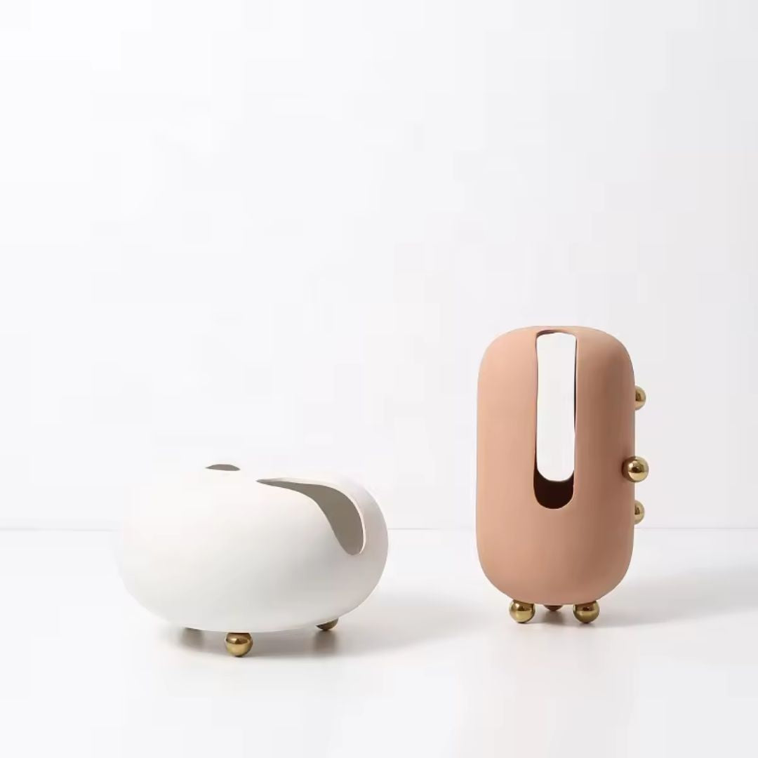 Small blush ceramic vase with gold stainless steel accents, designed by BEACON, perfect for elegant home decor.