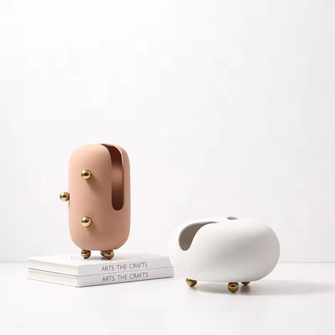 Small blush ceramic vase by BEACON with gold stainless steel detail, perfect for decorative floral arrangements.