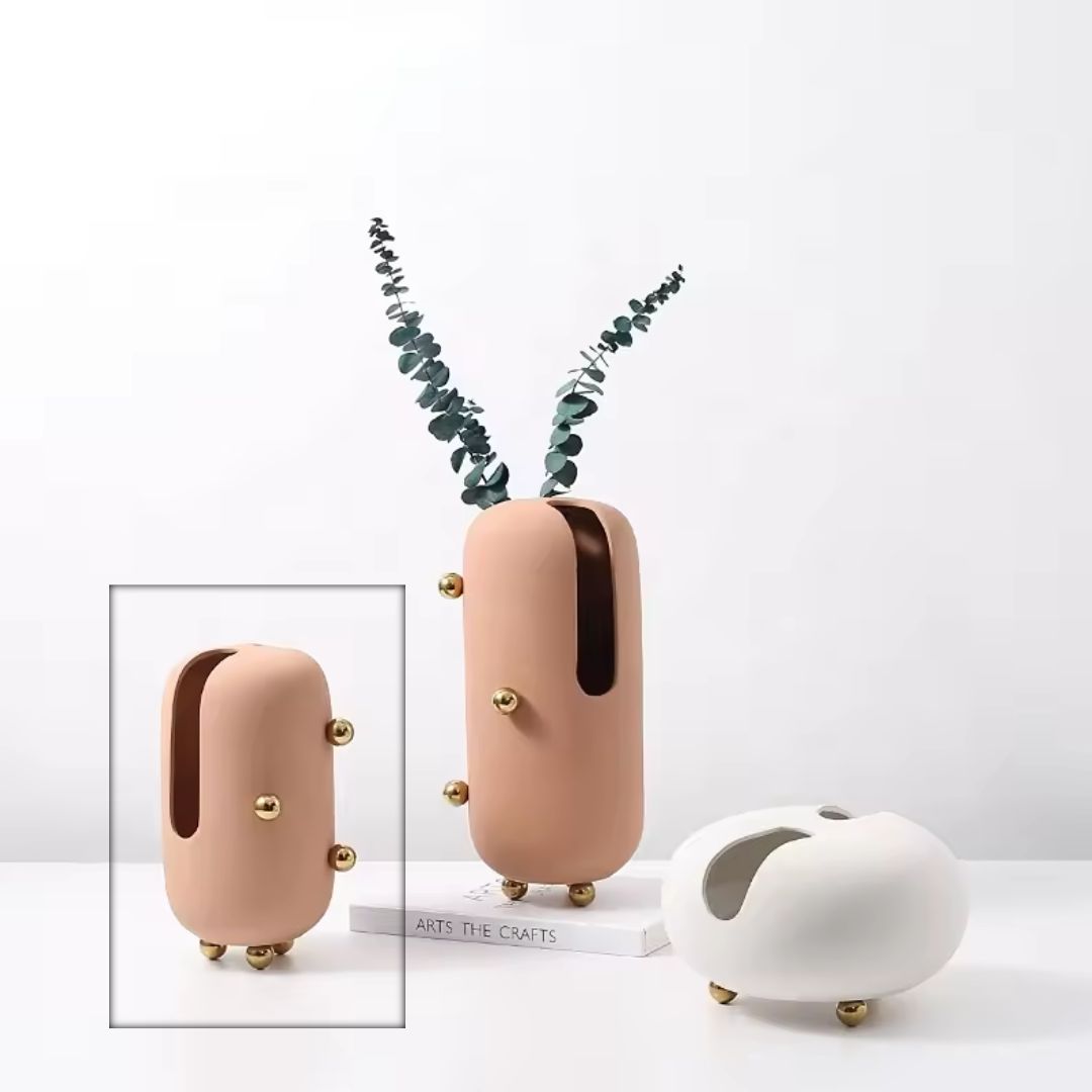 Small blush ceramic vase by BEACON with elegant gold stainless steel detail, perfect for floral display or decorative use.