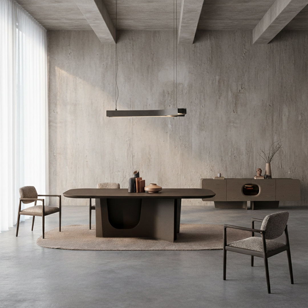 HOMAGE KOLTUK bold hanging pendant lamp with sleek design and modern style, illuminating a contemporary interior.