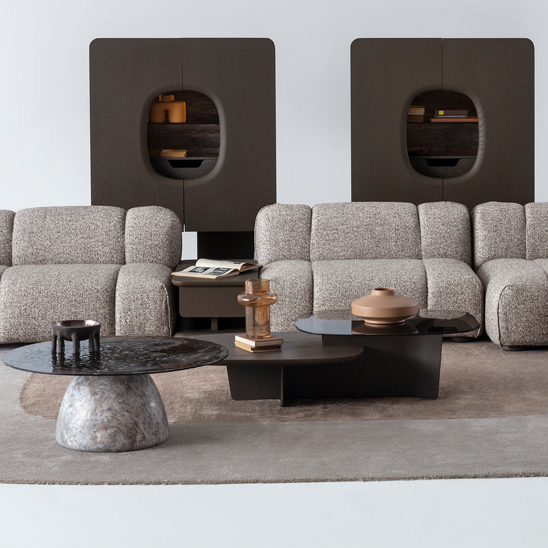 Bold Middle Coffee Table by HOMAGE KOLTUK features a modern design with a sleek tabletop and sturdy legs.