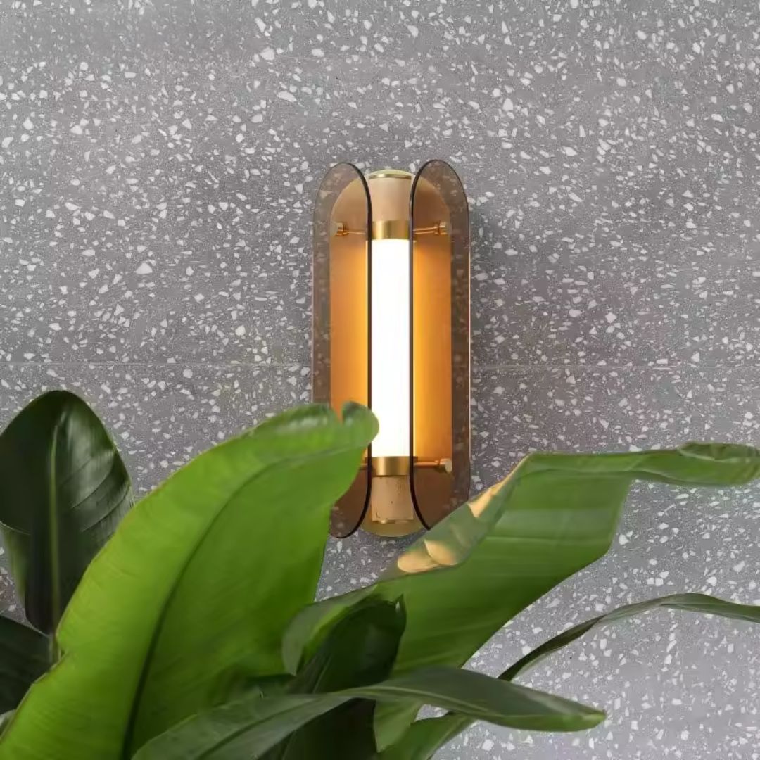 Brass, aluminum, and marble LED wall lamp by Beacon with modern design, featuring a sleek fixture and stylish materials.