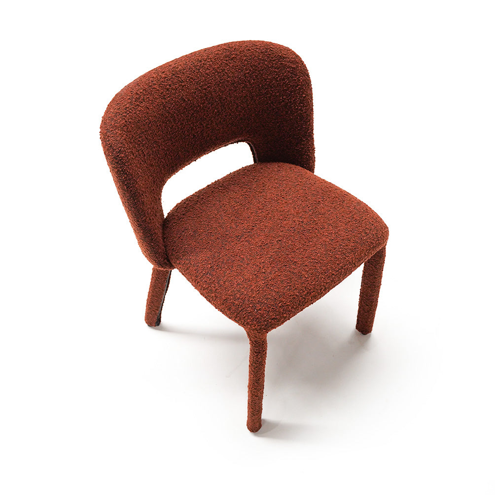 Brown dining chair with a sturdy steel frame from BEACON, featuring a comfortable upholstered seat and modern design.