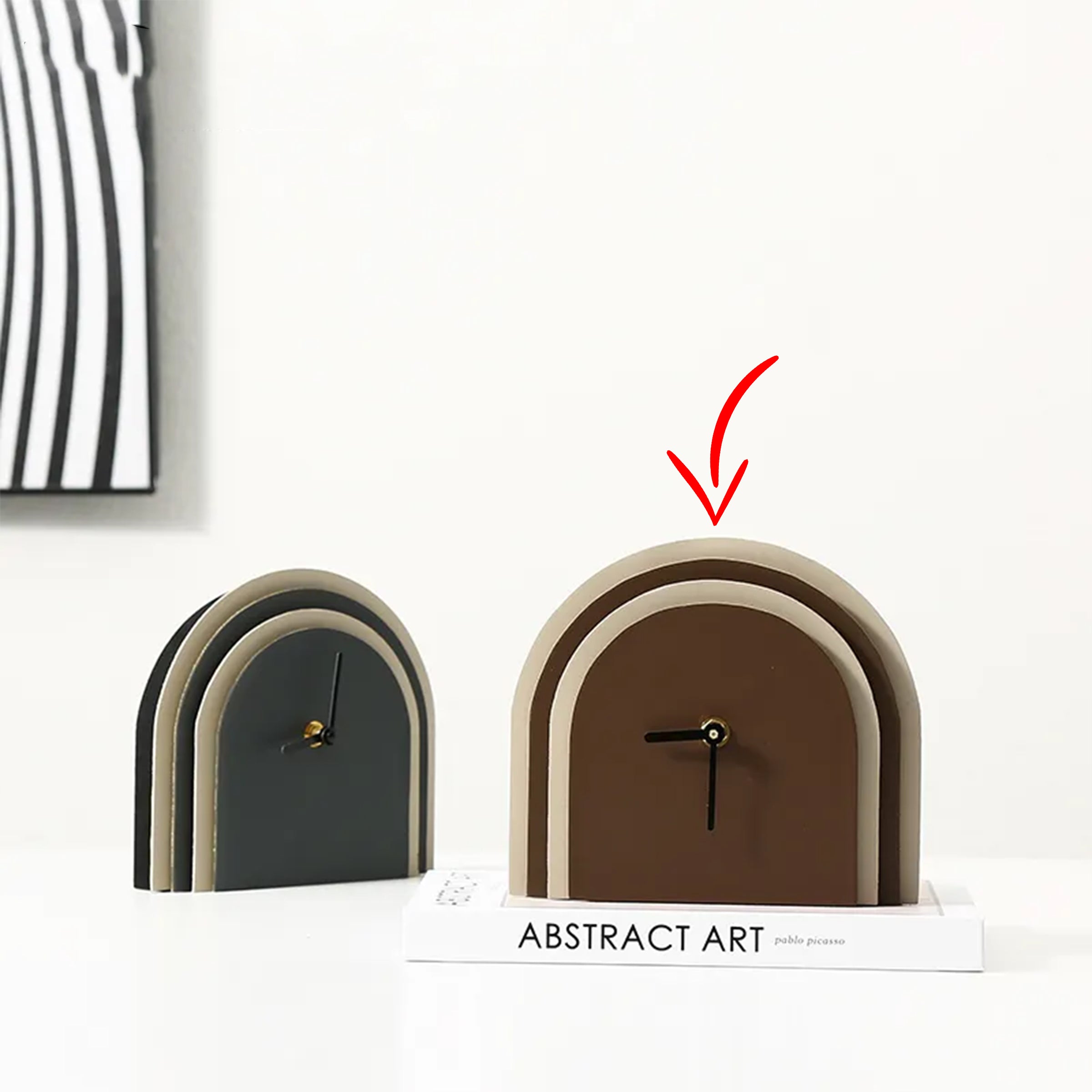 Brown leather clock by BEACON with a classic round face and leather strap, stylishly designed for home decor.