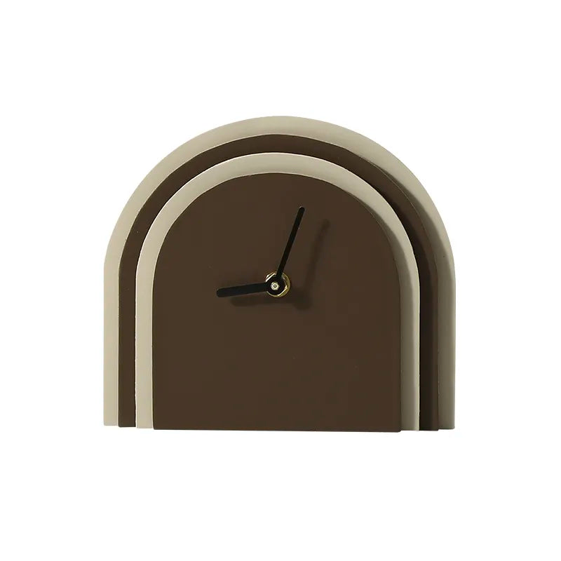 Brown leather clock by BEACON with a classic round face and elegant leather strap, ideal for stylish home decor.
