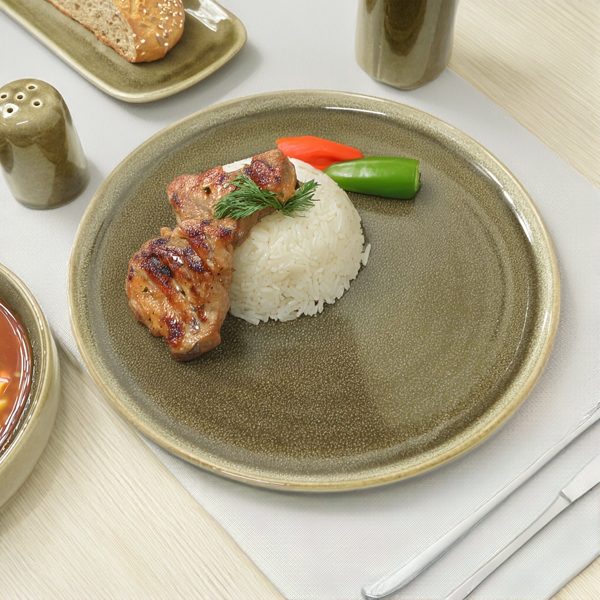 BEACON Browny Dinner Plate HZ4311, round ceramic plate with a glossy brown finish, perfect for serving meals.