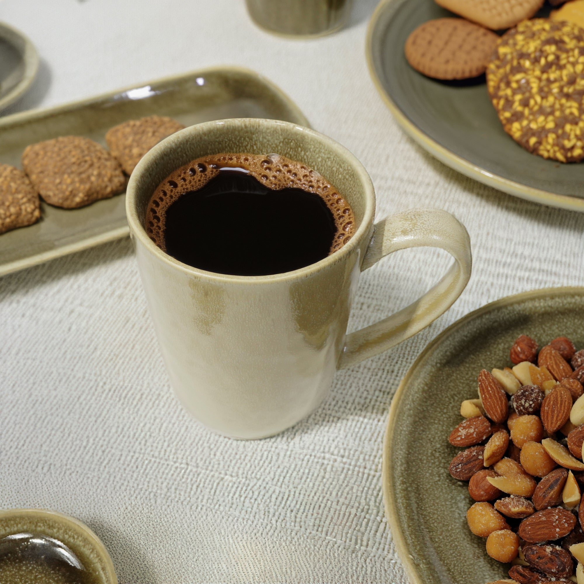Grey and brown reactive glazed mug by Beacon, featuring a warm, earthy design perfect for enjoying hot beverages.