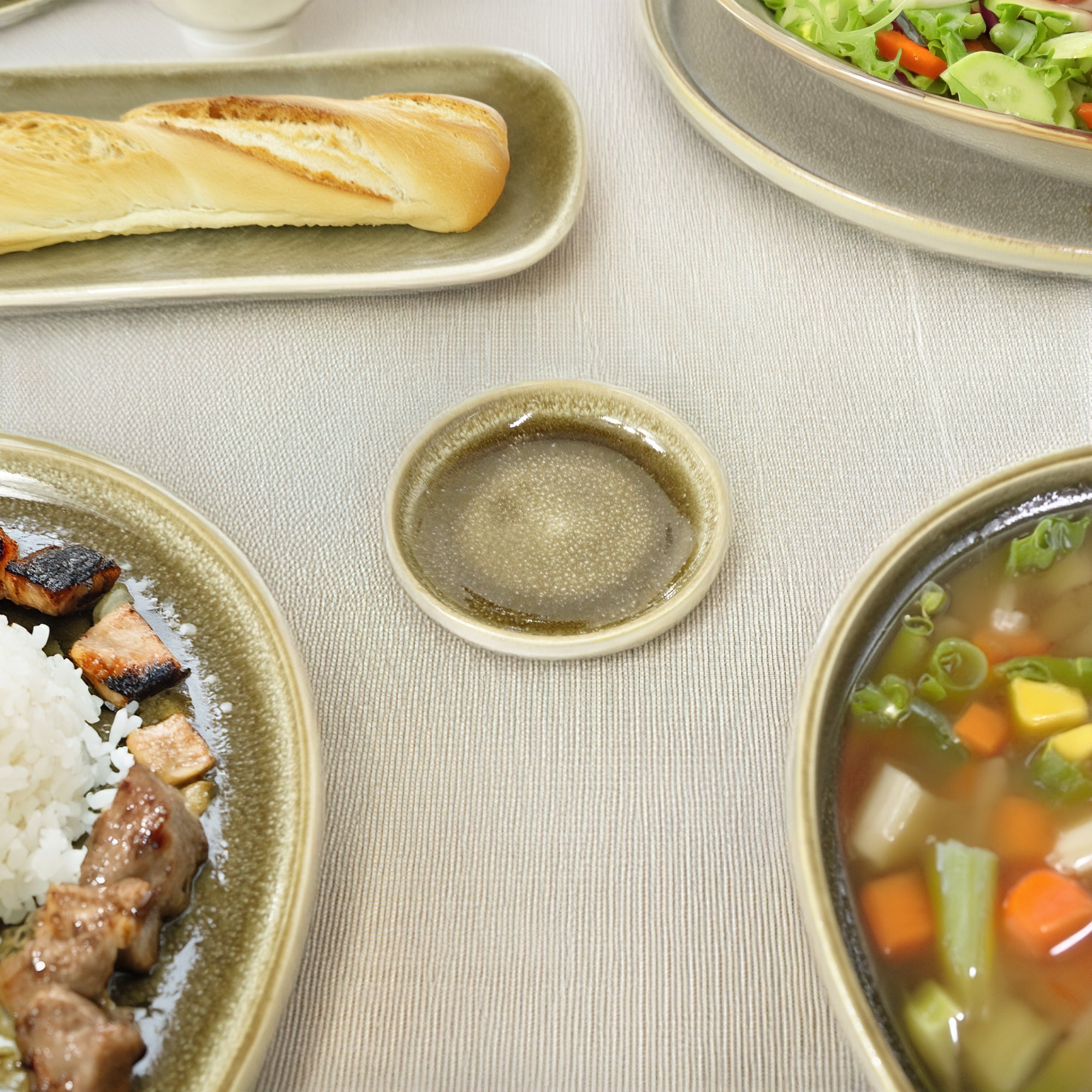Dark grey BEACON plates from the Browny Soil Dish collection, made of durable ceramic with a matte finish.
