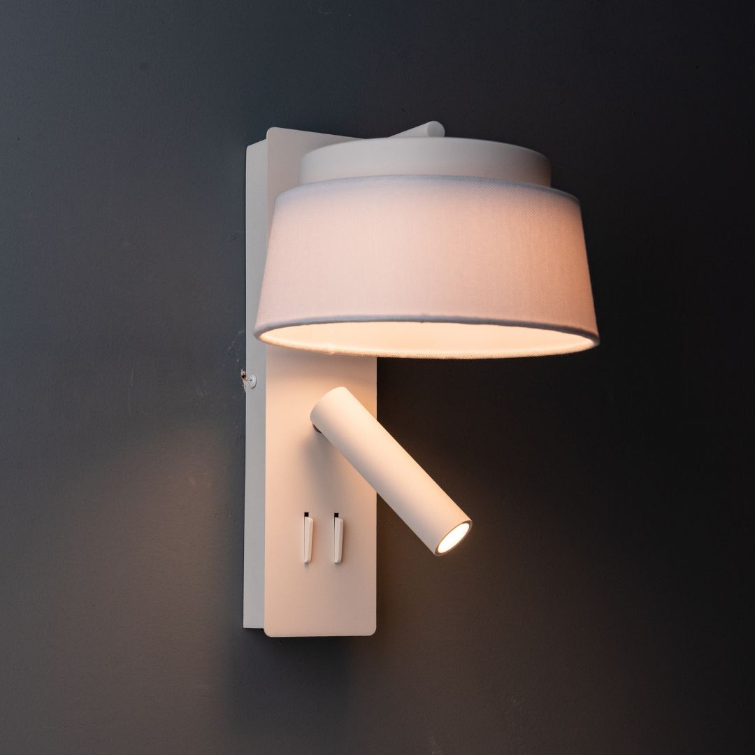 BEACON Calm hotel-style wall reading lamp with white and grey linen shade, designed for headboard or wall lighting.