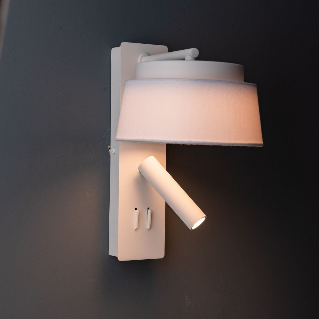 Calm hotel-style wall reading lamp with white and grey linen shade, designed for headboards and wall decor by BEACON.