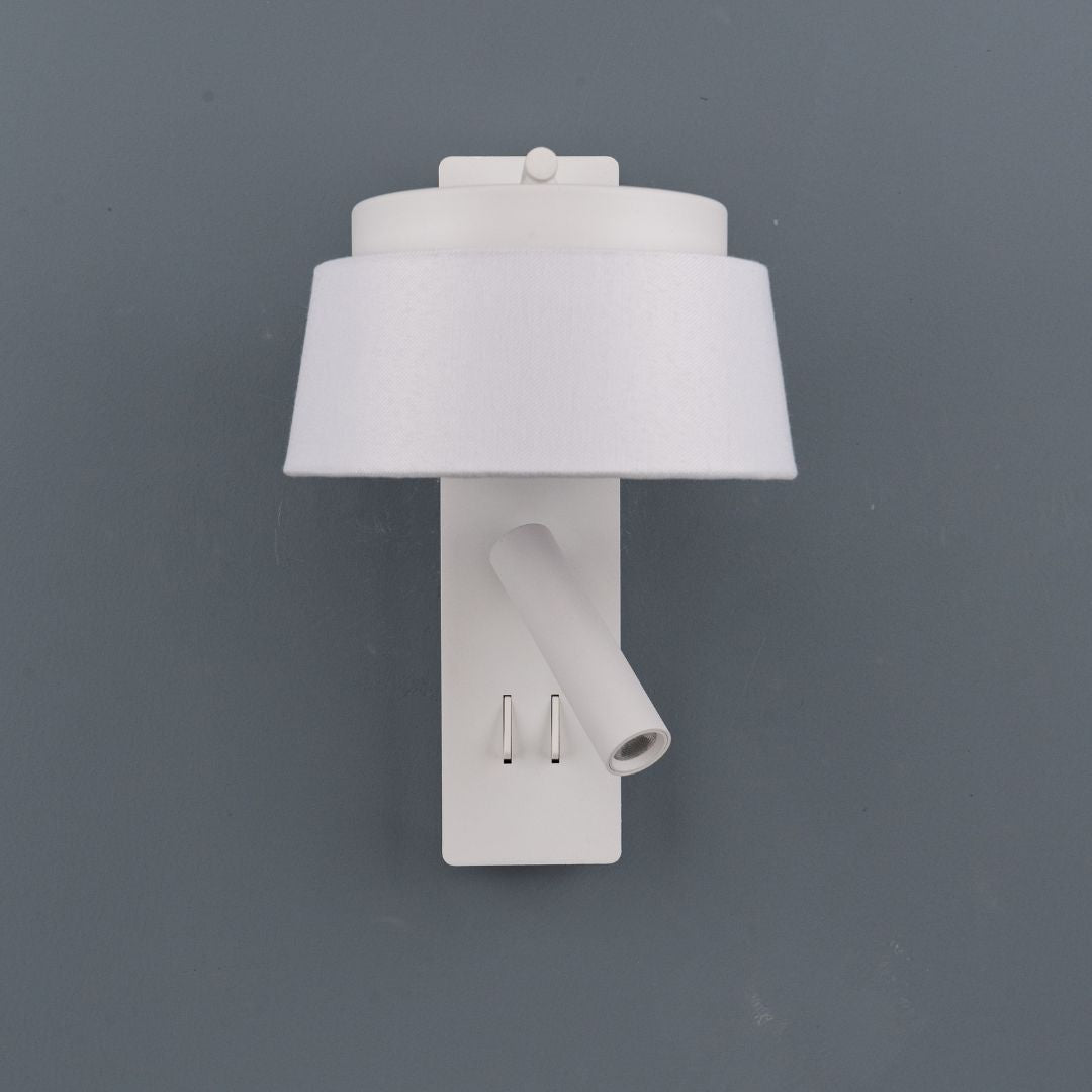 Calm hotel style wall reading lamp with white and grey linen shade, designed for headboards or wall mounting, by BEACON.