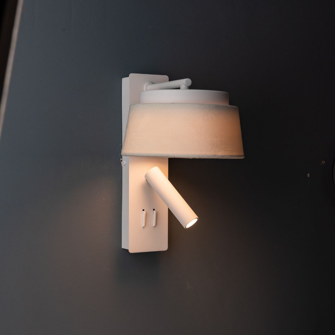 Calm hotel-style wall reading lamp by BEACON with white and grey linen shade, ideal for headboard or wall lighting.