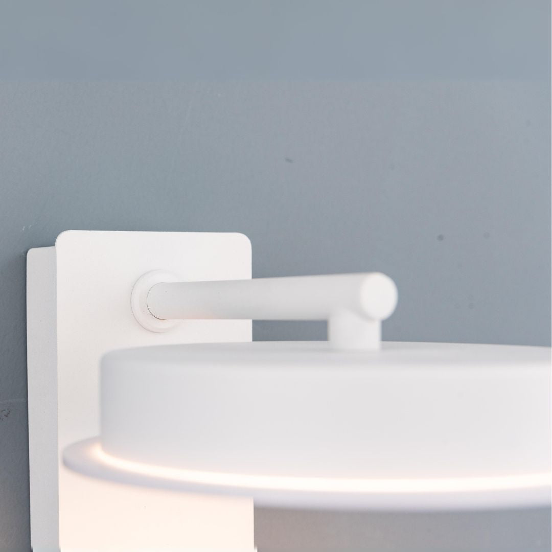 BEACON Calm hotel-style wall reading lamp with white and grey linen shade, designed for headboard or wall mounting.