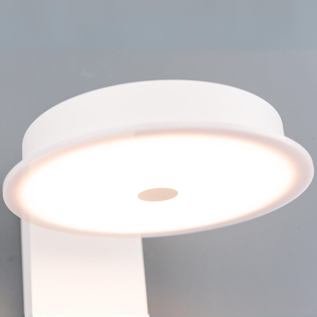 Calm hotel-style wall lamp with white and grey linen shade, suitable for headboards or wall reading lighting.