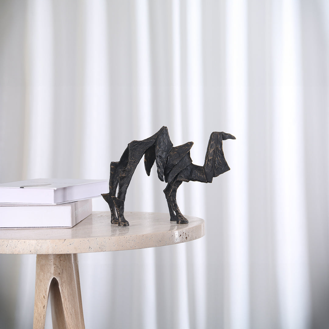 Beige camel sculpture by BEACON, a stylish home decor figurine with detailed craftsmanship.