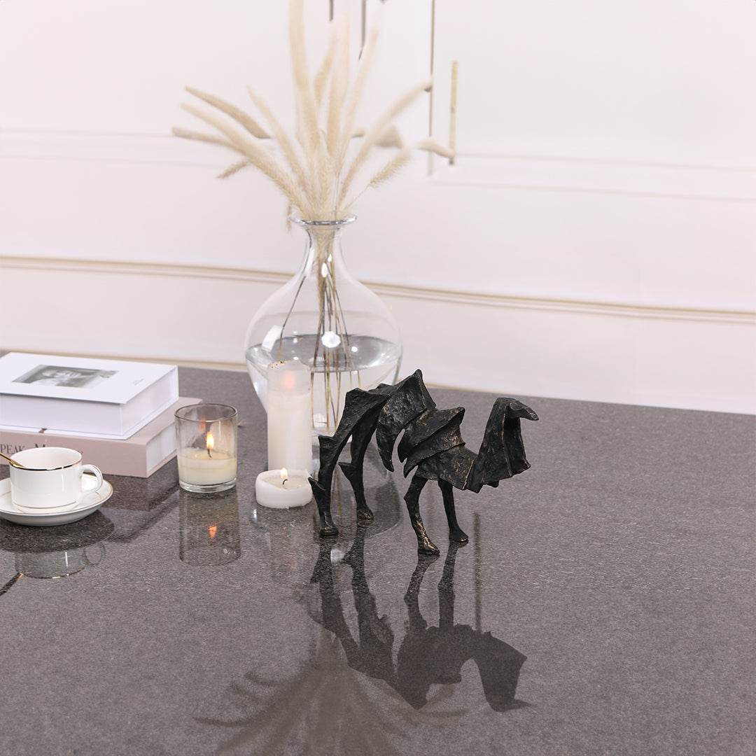 Beige ceramic camel sculpture from BEACON home decor figurines collection, detailed and stylish for interior decoration.