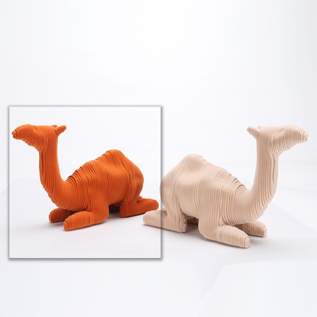 Orange ceramic camel sculpture by BEACON, ideal as a home decor figurine with detailed craftsmanship.