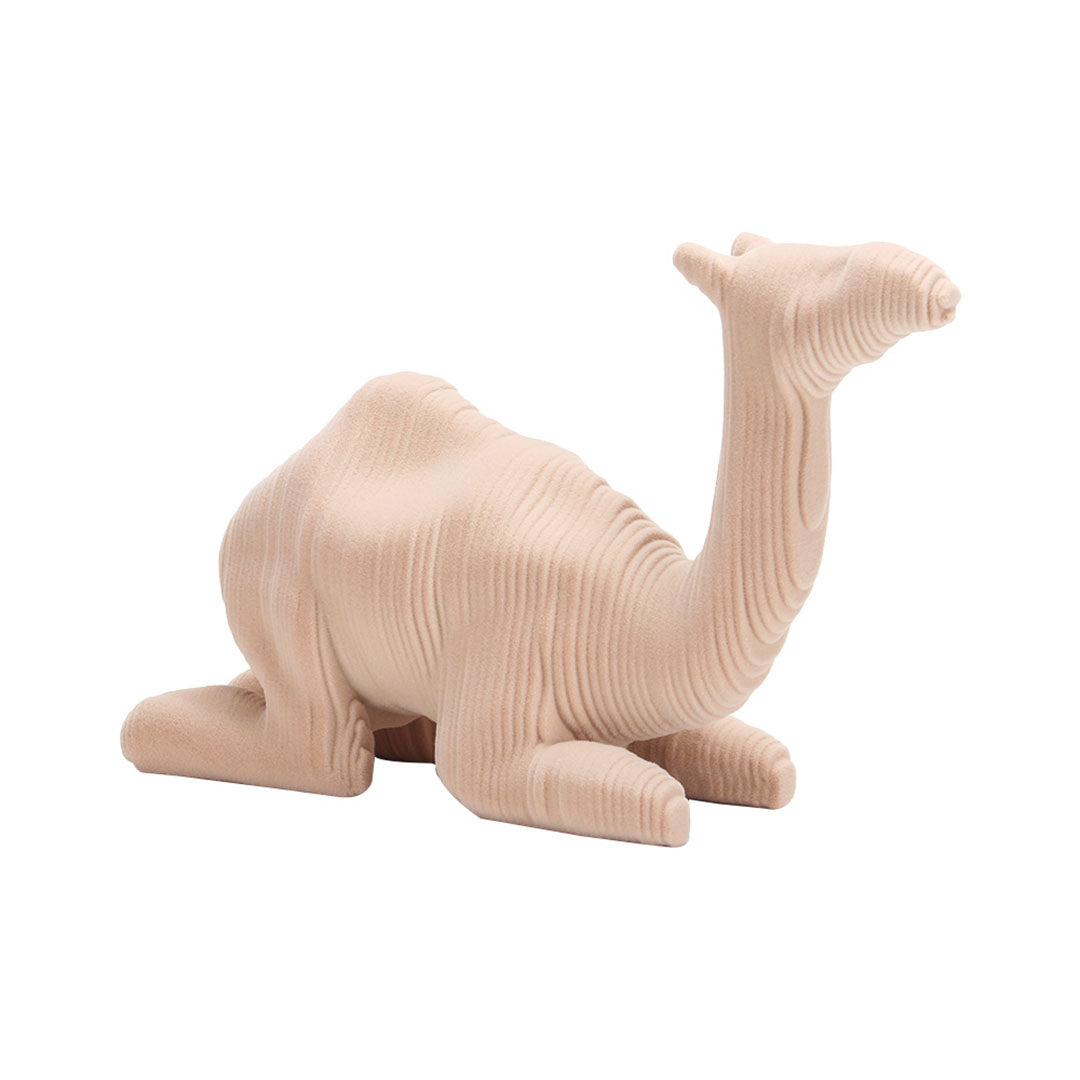 Beige camel sculpture from BEACON home decor figurines collection, detailed and stylish decorative figurine for interior spaces.