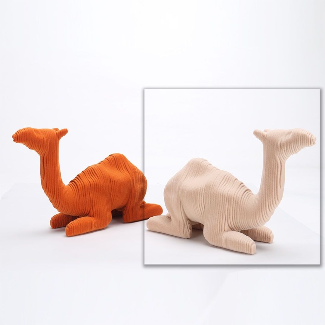 Beige camel sculpture from BEACON home decor figurines, detailed camel figurine for stylish interior decoration.