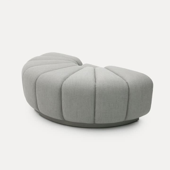 Chameleon Sofa Half-Round Module by BEACON, modern sofa with curved design and plush cushions, in a stylish living room setting.