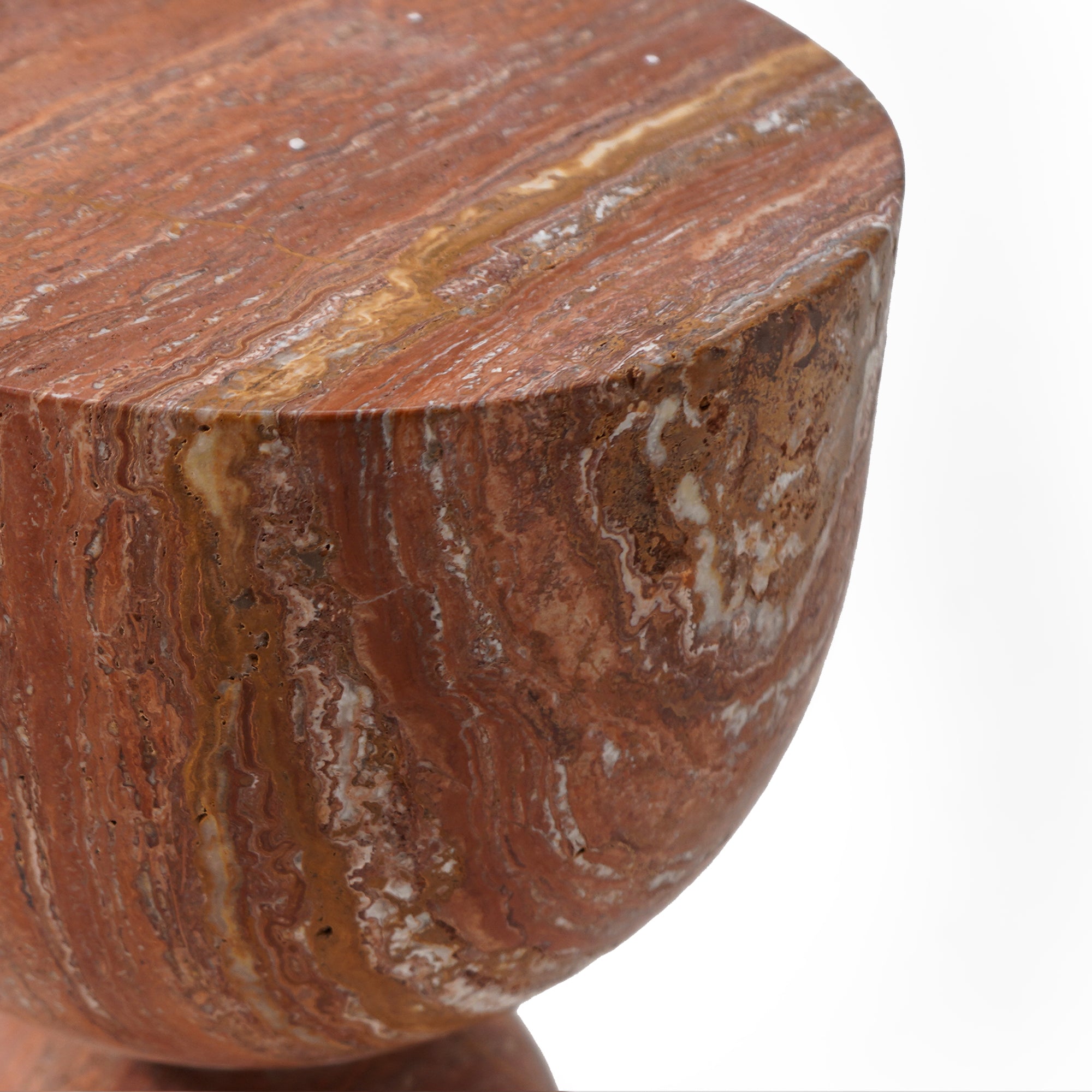 Natural red travertine side table with chess-patterned surface by BEACON, featuring a sleek, modern design.