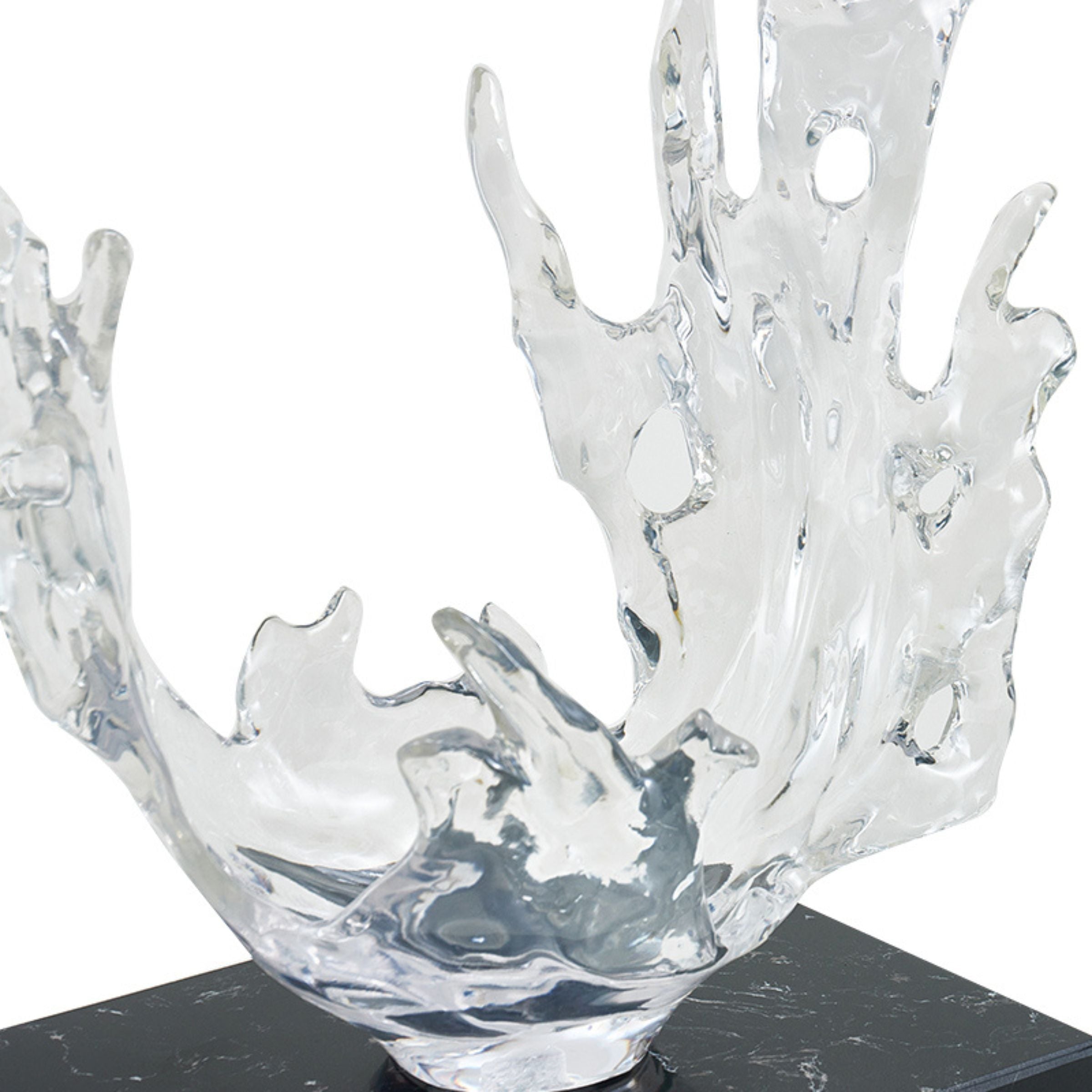 Clear abstract sculpture from BEACON home decor figurines collection, modern art piece with sleek, transparent design.