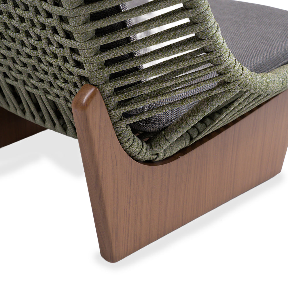 Beacon Clogs lounge chair with seat and back cushions, modern armchair with plush upholstery and stylish design.