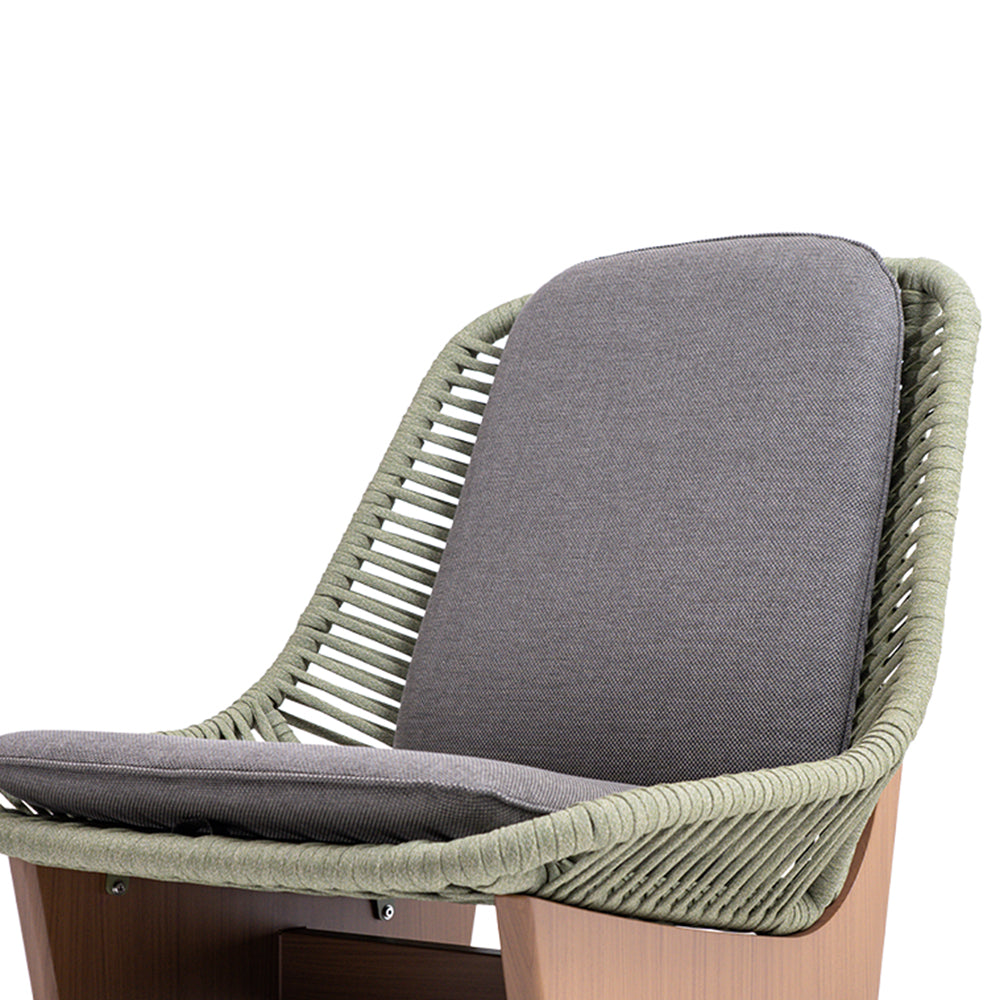 BEACON Clogs lounge chair with seat and back cushions, modern armchair featuring a sleek design and comfortable upholstery.