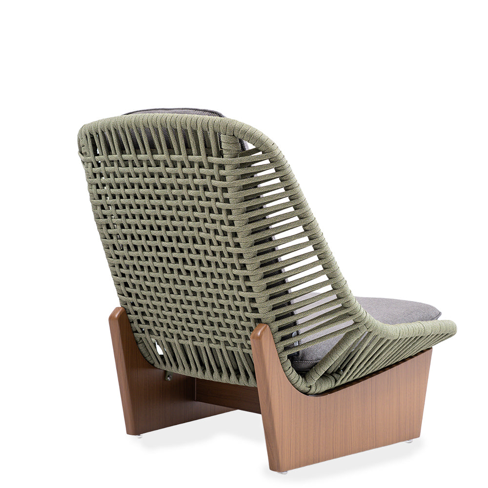 Beacon Clogs lounge armchair with seat and back cushions, modern design, beige upholstery, and wooden legs.