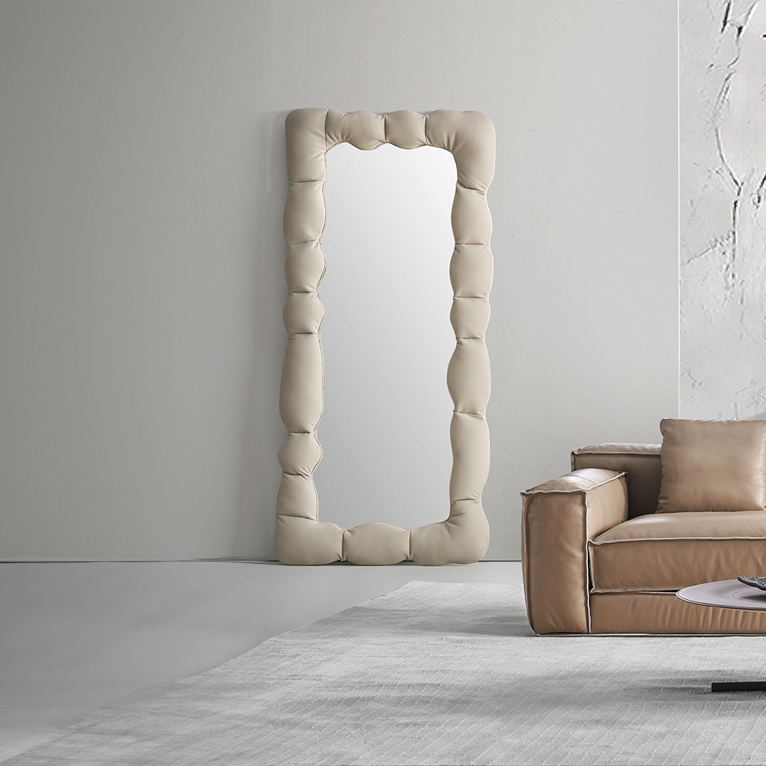 BEACON CloudPuff upholstered full-length mirror with soft cloud-inspired frame, standing upright in a modern room setting