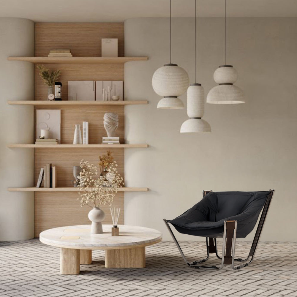 Black Cocoon Lounge Chair by BEACON, modern seating with a cozy, rounded design and sleek black finish.
