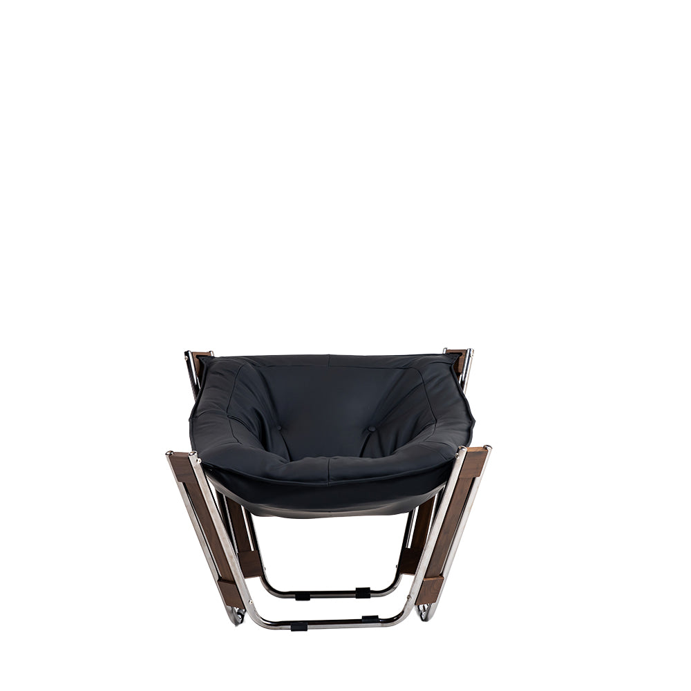 Black Cocoon Lounge Chair by BEACON, PS-A179 model, featuring a cozy, rounded design perfect for relaxing.