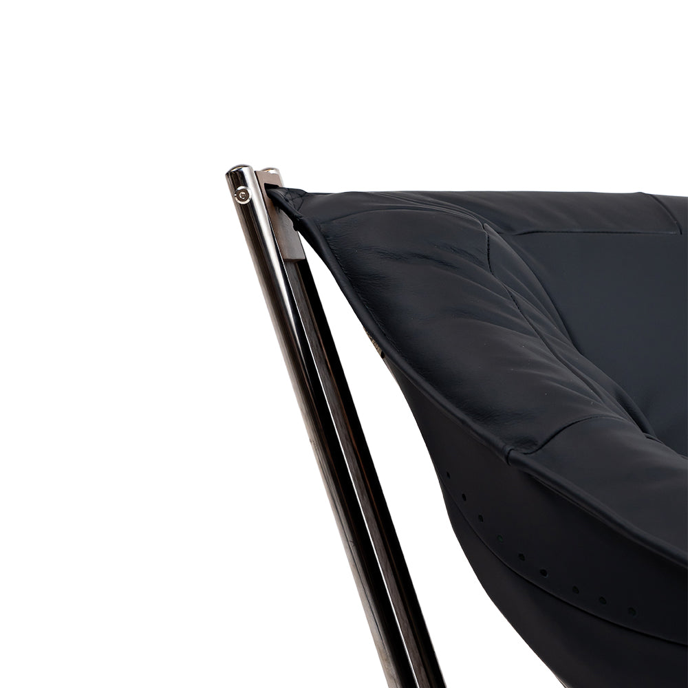 Black Cocoon Lounge Chair by BEACON, modern seating with a cozy, rounded design and smooth fabric upholstery.