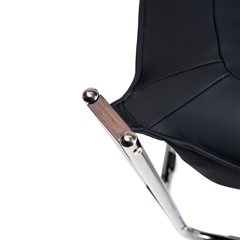 Black Cocoon Lounge Chair by BEACON, PS-A179 model, featuring a modern, rounded design perfect for relaxing spaces.