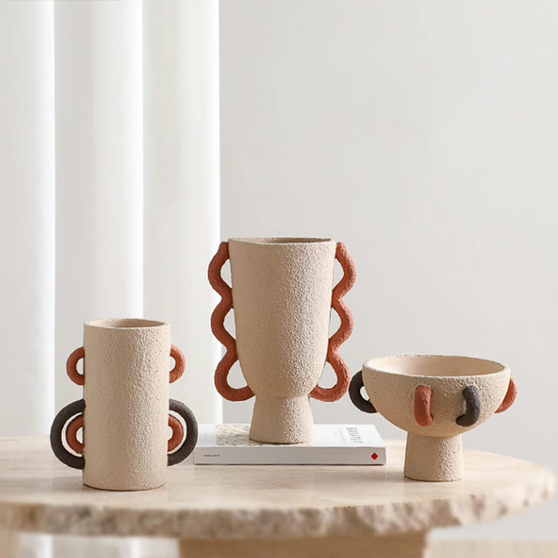 Colorful ring-shaped vase by BEACON, vibrant ceramic design with bold, swirling colors and a smooth, rounded shape.