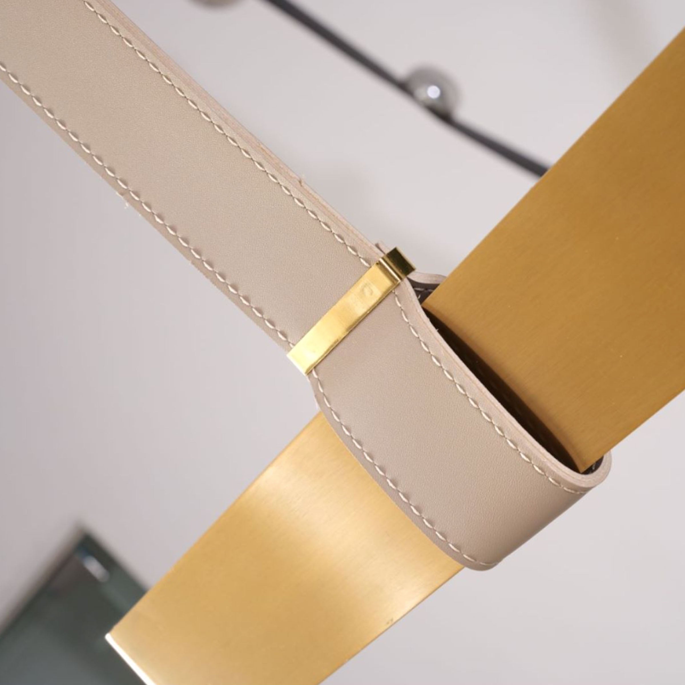 Beige leather and gold pendant lamp with comet tail design, 1.5m length, from BEACON CYDG, modern ceiling lighting fixture.