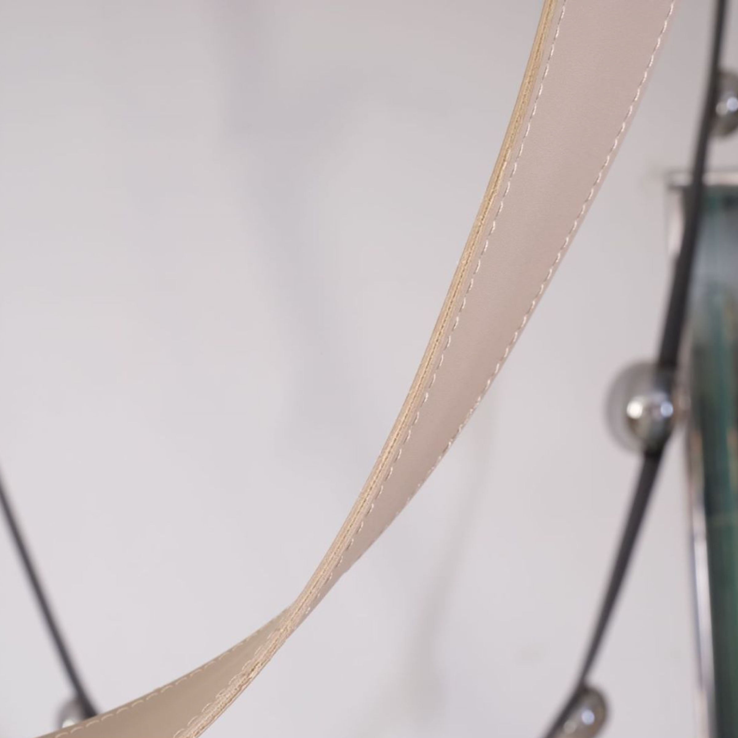 Gold leather pendant lamp by BEACON with comet tail design, 1.5m length, hanging fixture for modern interior lighting.