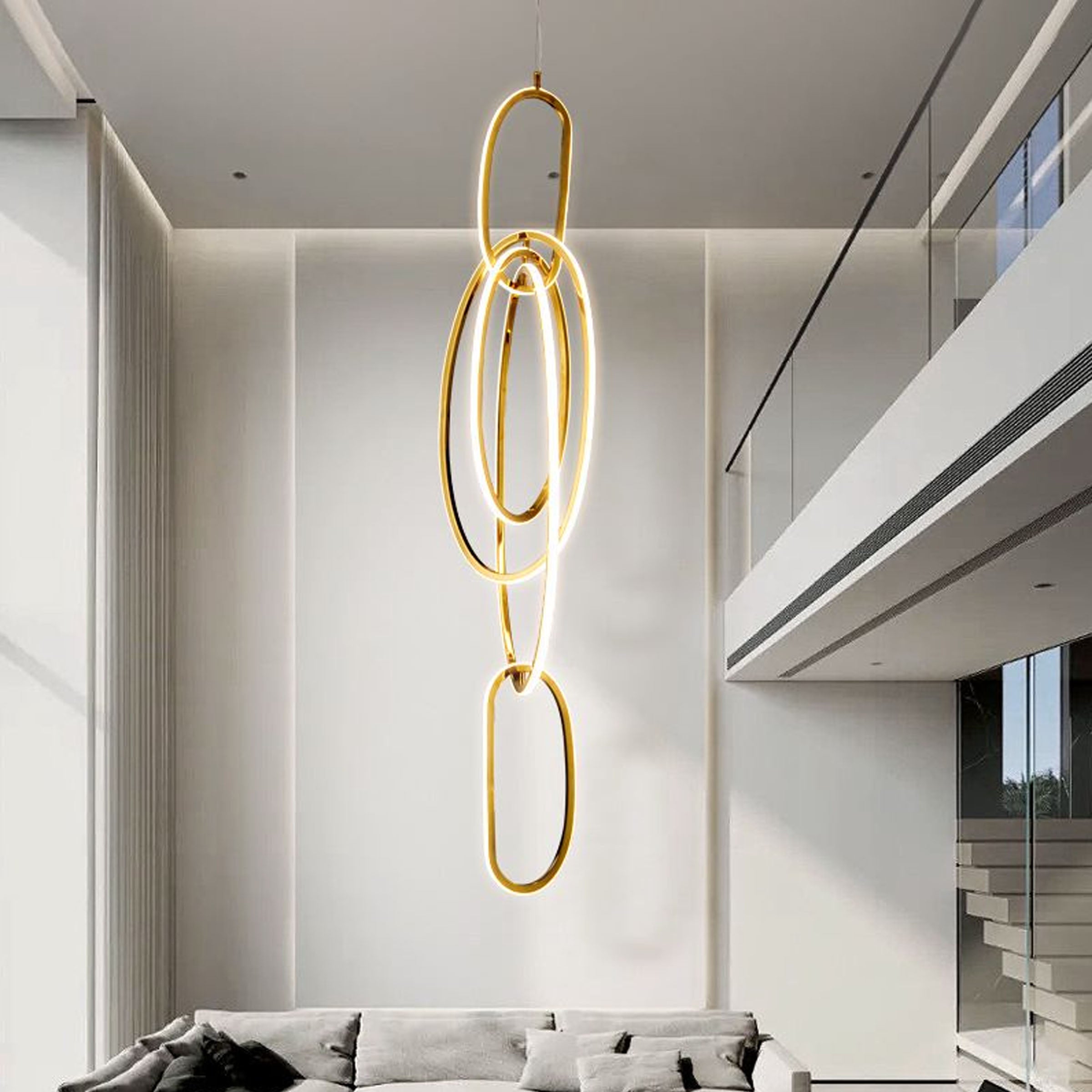 Golden pendant lamp with cosmic ring design by BEACON, pendant lighting fixture for modern interior decor.