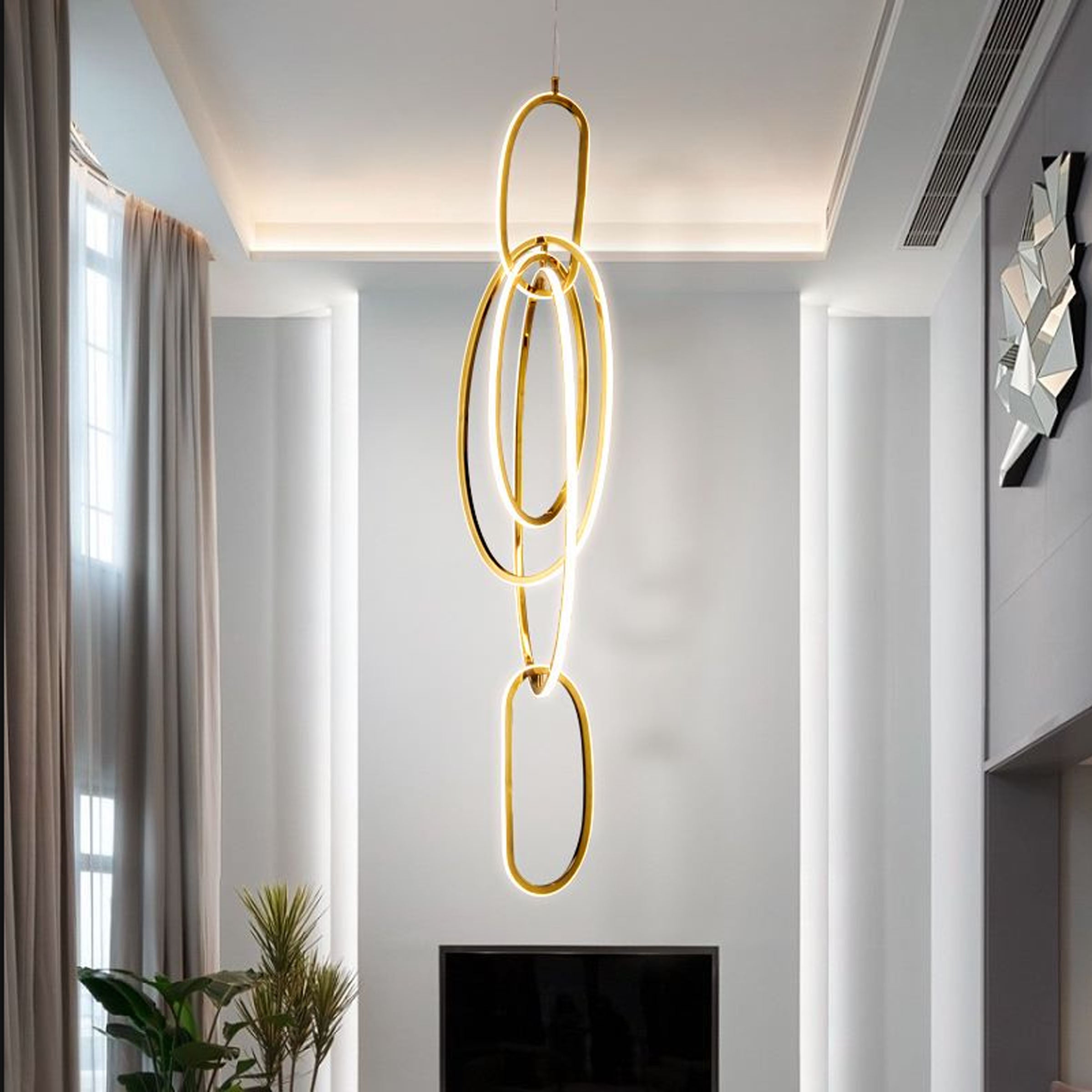 Cosmic Rings Golden Pendant Lamp from BEACON, modern pendant lighting with a celestial-inspired design and warm golden finish.