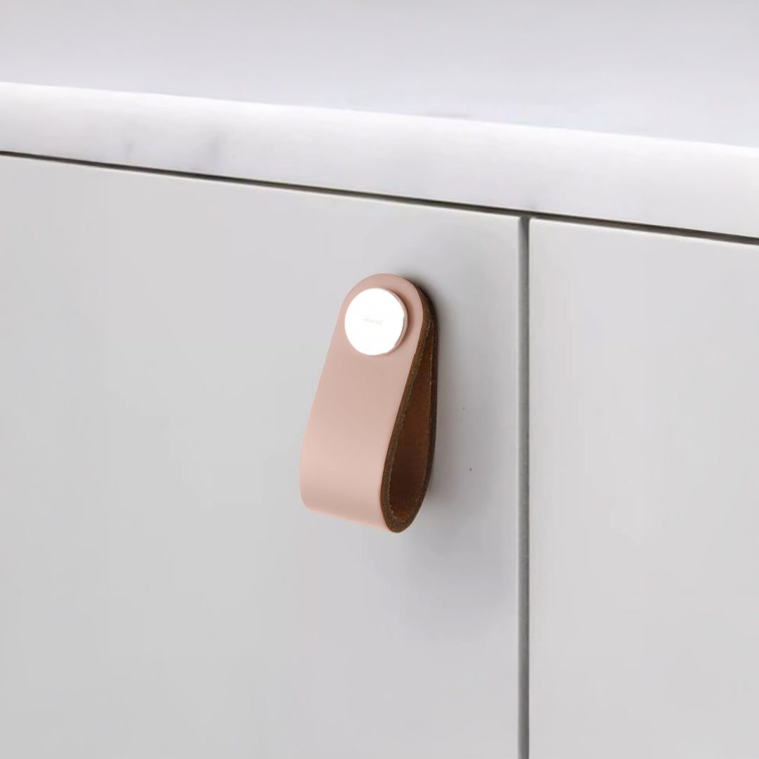 Cowhide layer and stainless steel button knob door handle by BEACON, featuring a textured cowhide surface and sleek metal finish.