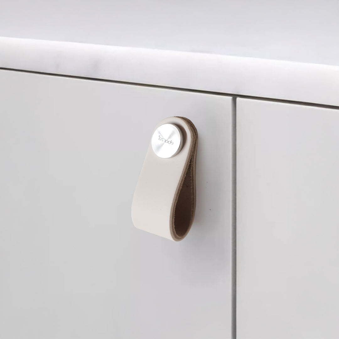 Cowhide layer and stainless steel button door handle by BEACON, featuring a stylish cowhide finish and modern design.