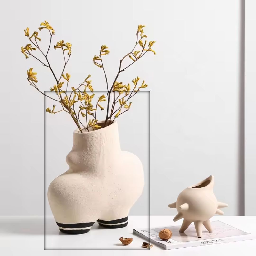Cream ceramic vase with black stripe detail, stylish decorative vase from BEACON, perfect for contemporary home decor.