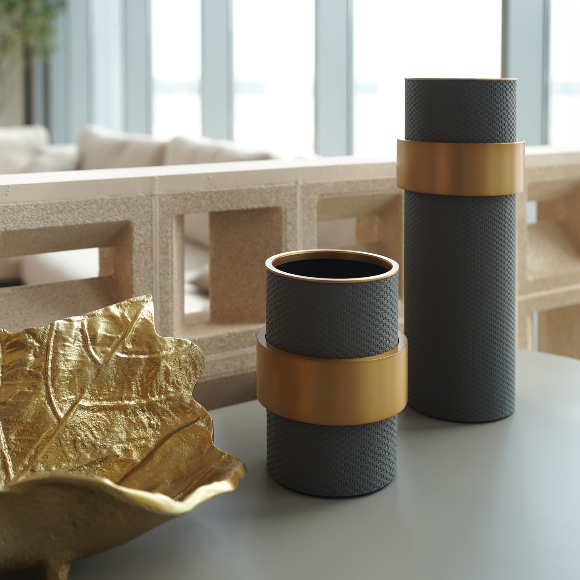 Dark grey Anqitu flower vase by Beacon, with a sleek, modern design, perfect for displaying floral arrangements.