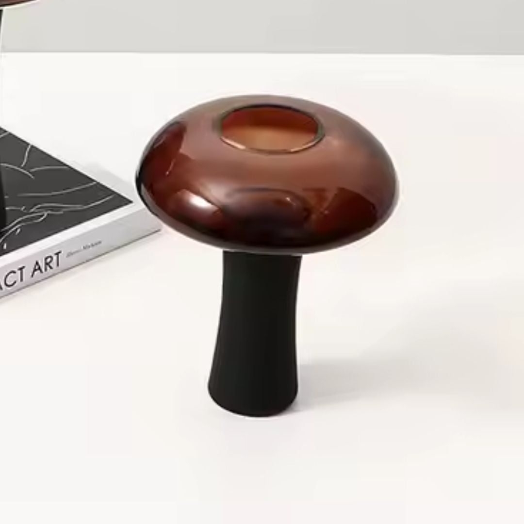 Medium deep amber and black glass bud vase with stem by BEACON, showcasing elegant vase design and rich color tones.