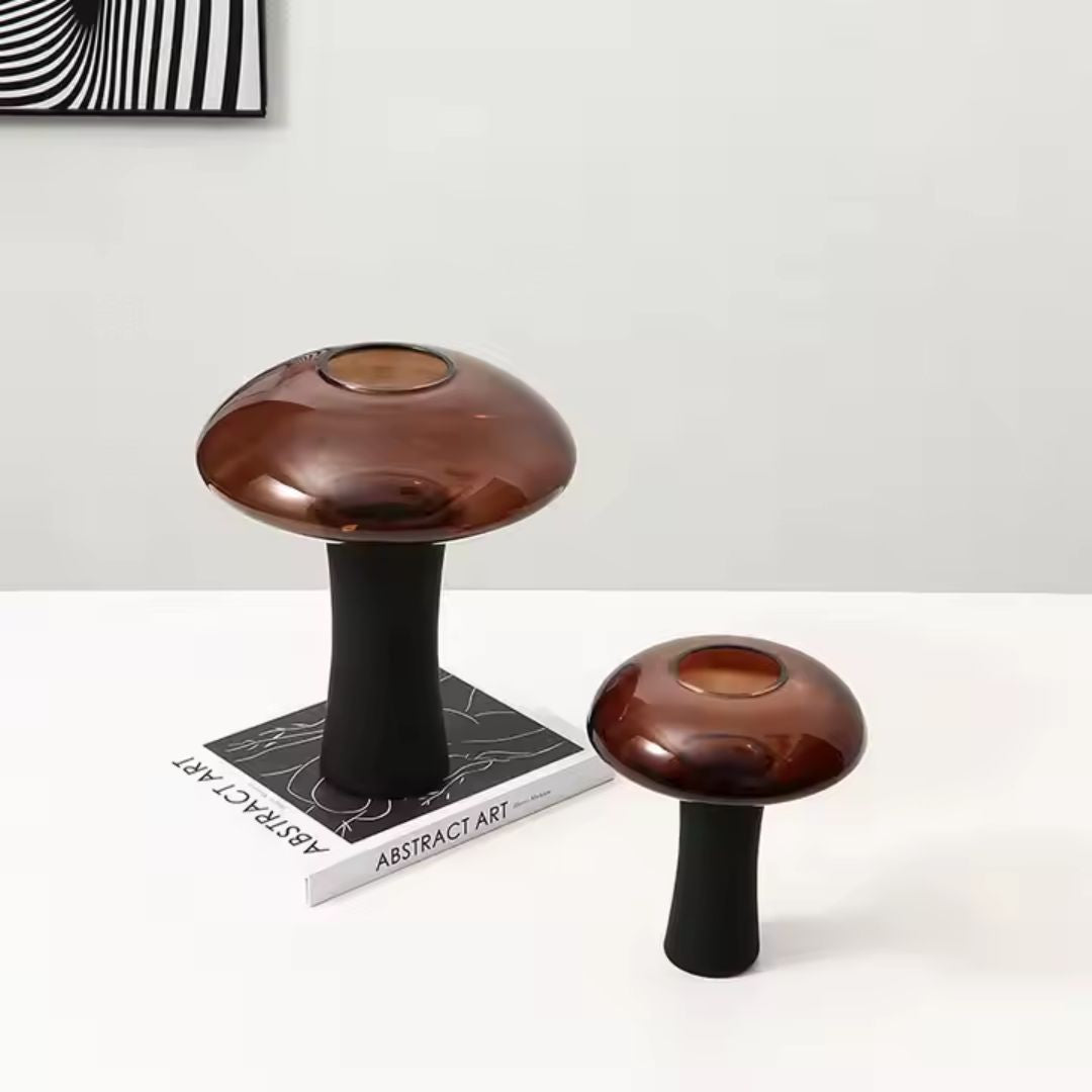 Medium deep amber and black glass bud vase with stem, from BEACON, designed for floral arrangements.