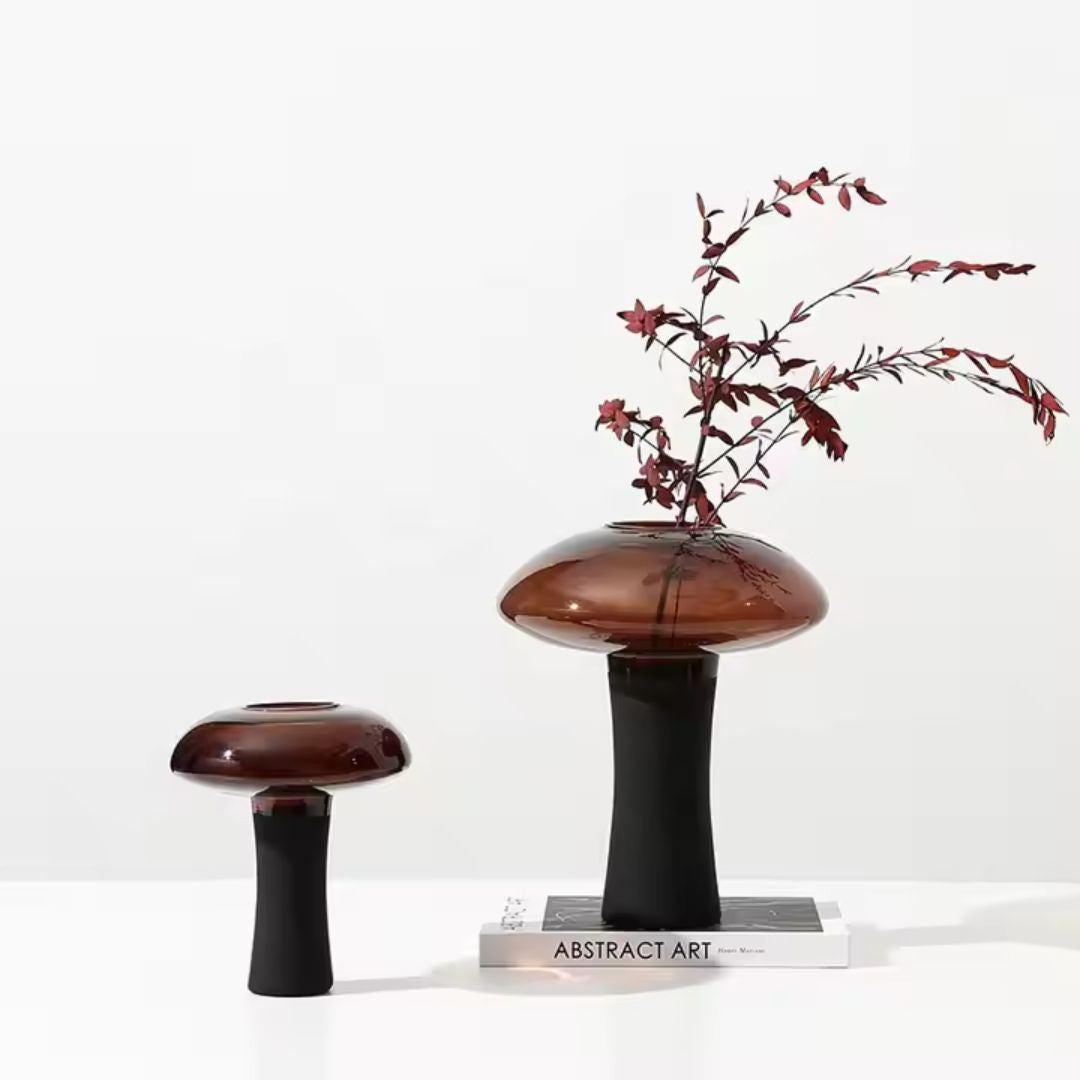 Medium deep amber and black glass bud vase with stem, designed by BEACON, perfect for floral arrangements.