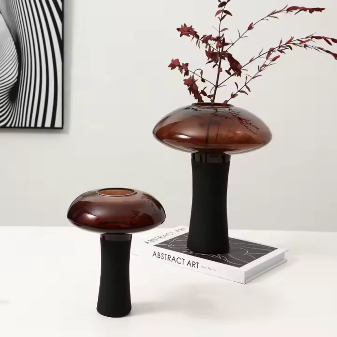 Medium deep amber and black glass bud vase with stem, by BEACON, designed for floral arrangements.