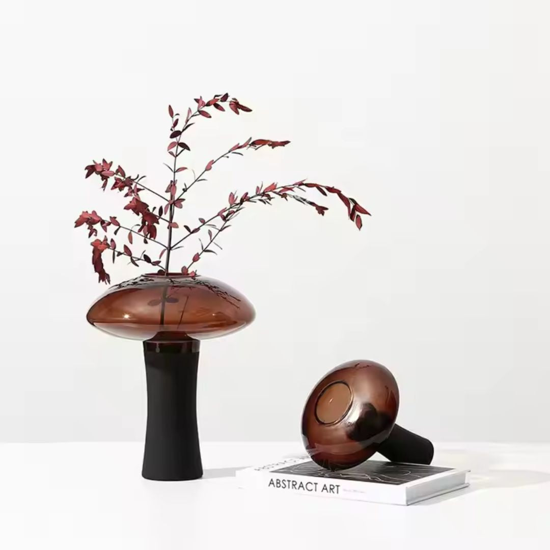 Medium deep amber and black glass bud vase with stem, designed by BEACON, perfect for floral arrangements.