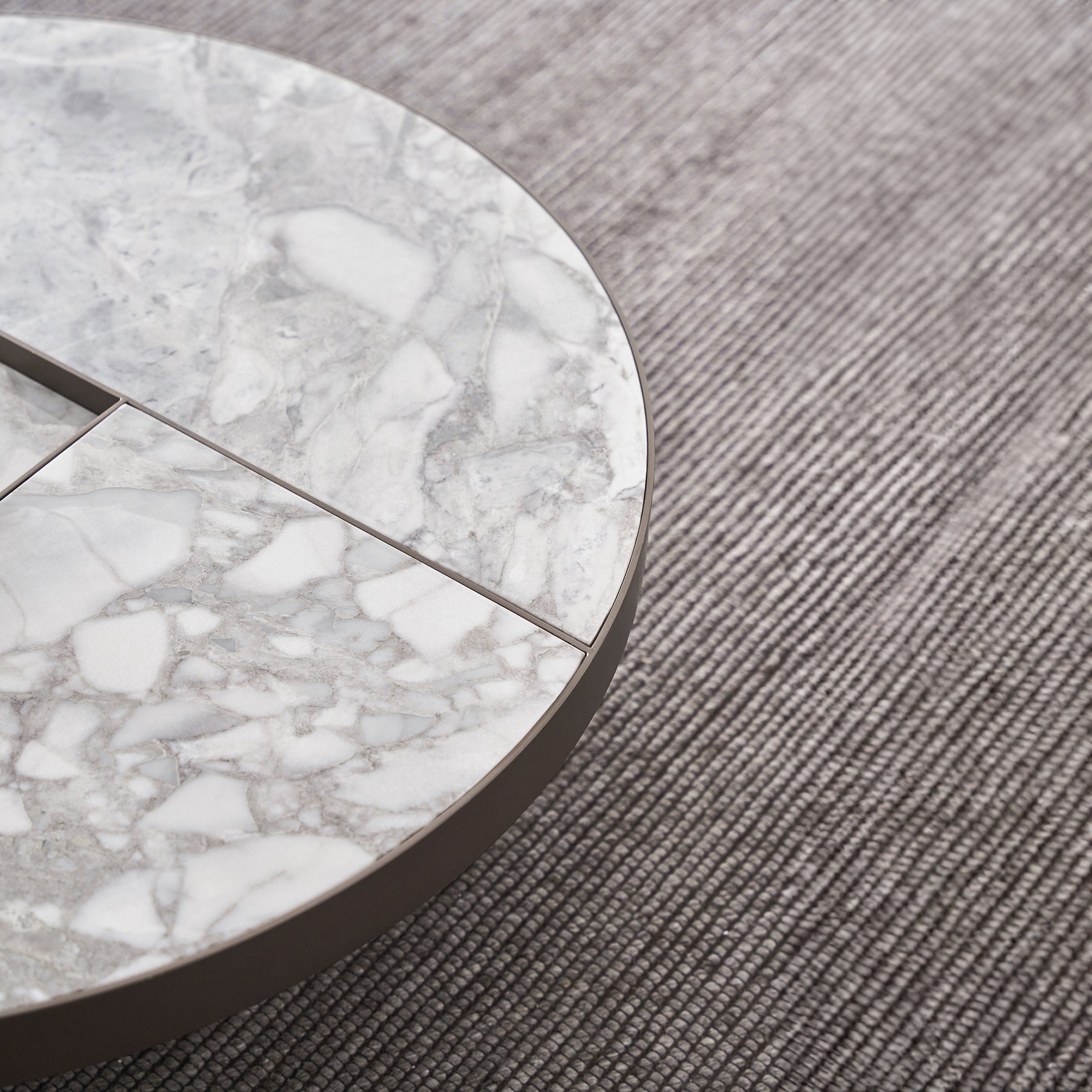 Desert marble coffee table by BEACON with a sleek, modern design, featuring a smooth desert-colored marble surface and sturdy base.