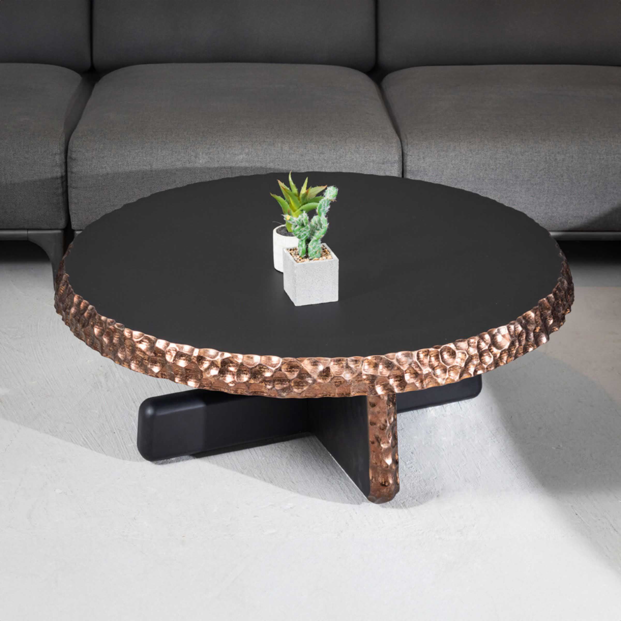 Alfa round center table by TOGO HOME STYLE with a modern gray finish, perfect for living room display.